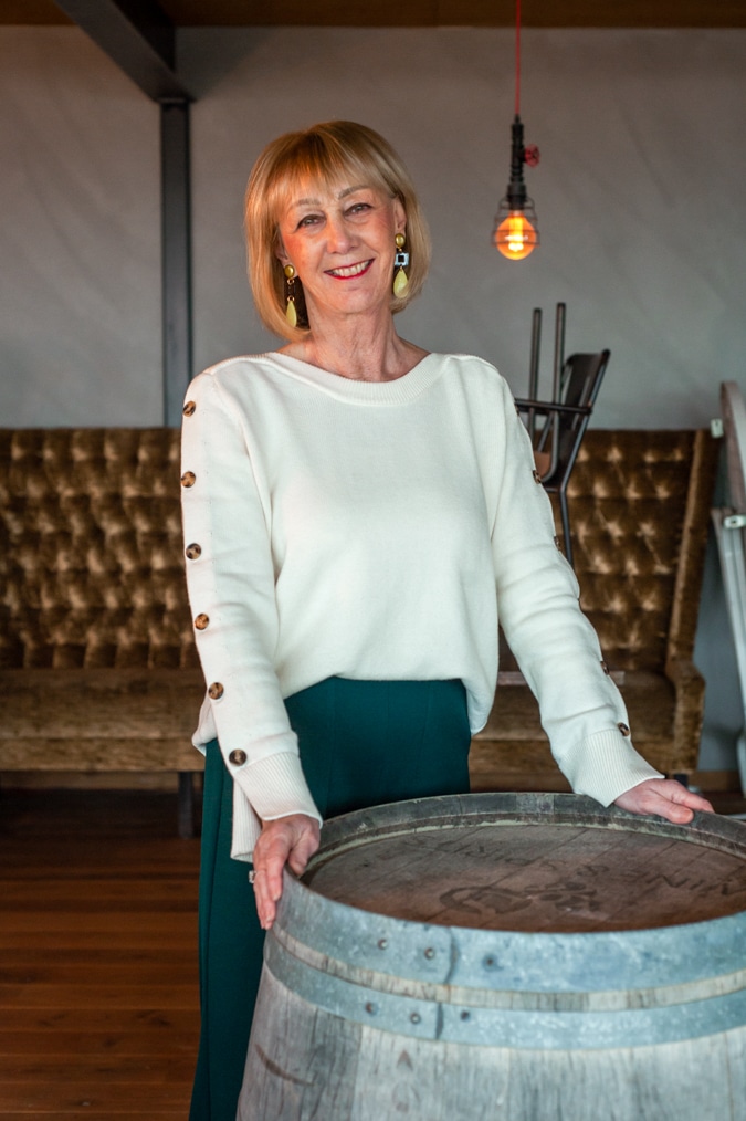 Cream jumper on wide green trousers