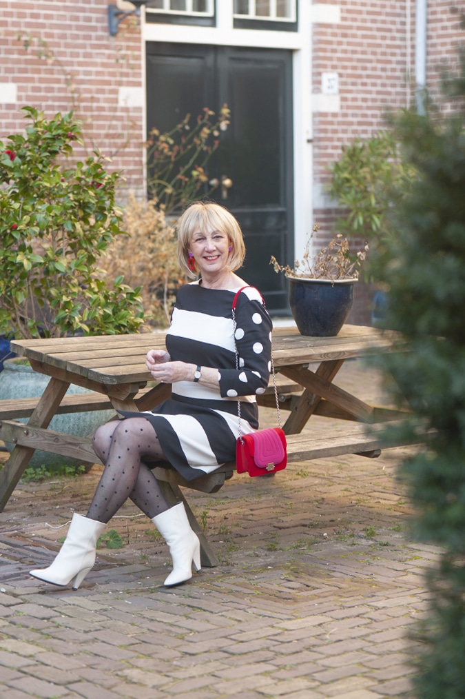 black and white dress with stripes and polka dots