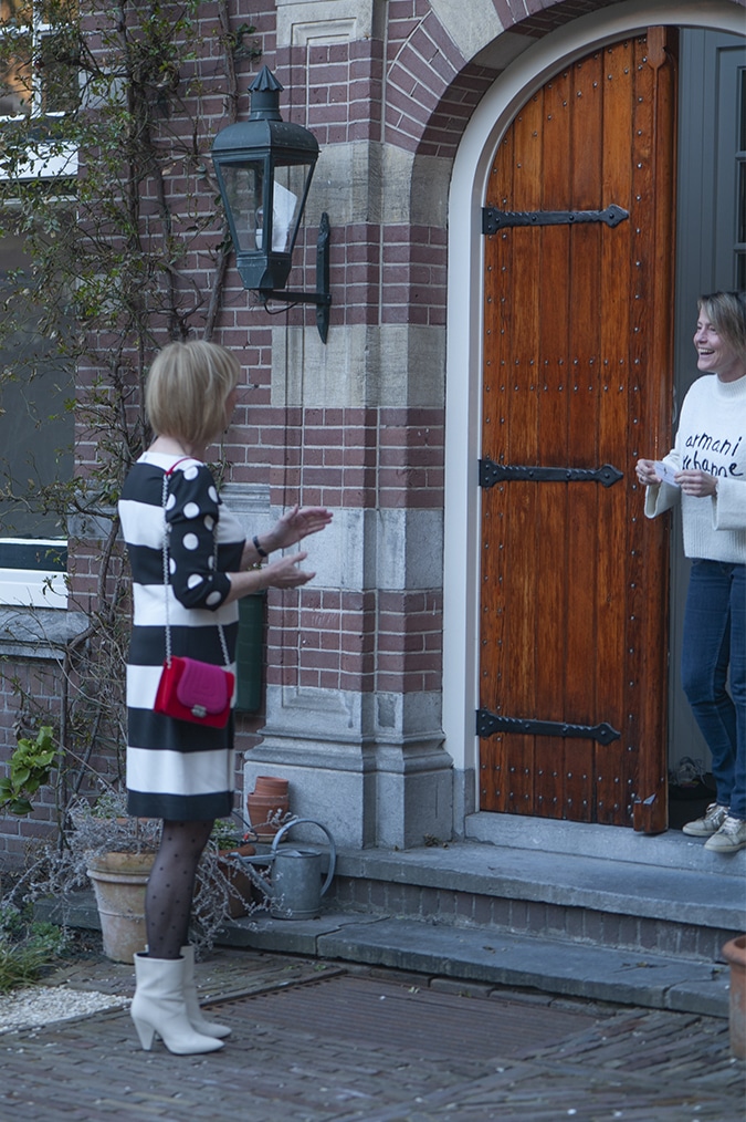black and white dress with stripes and polka dots
