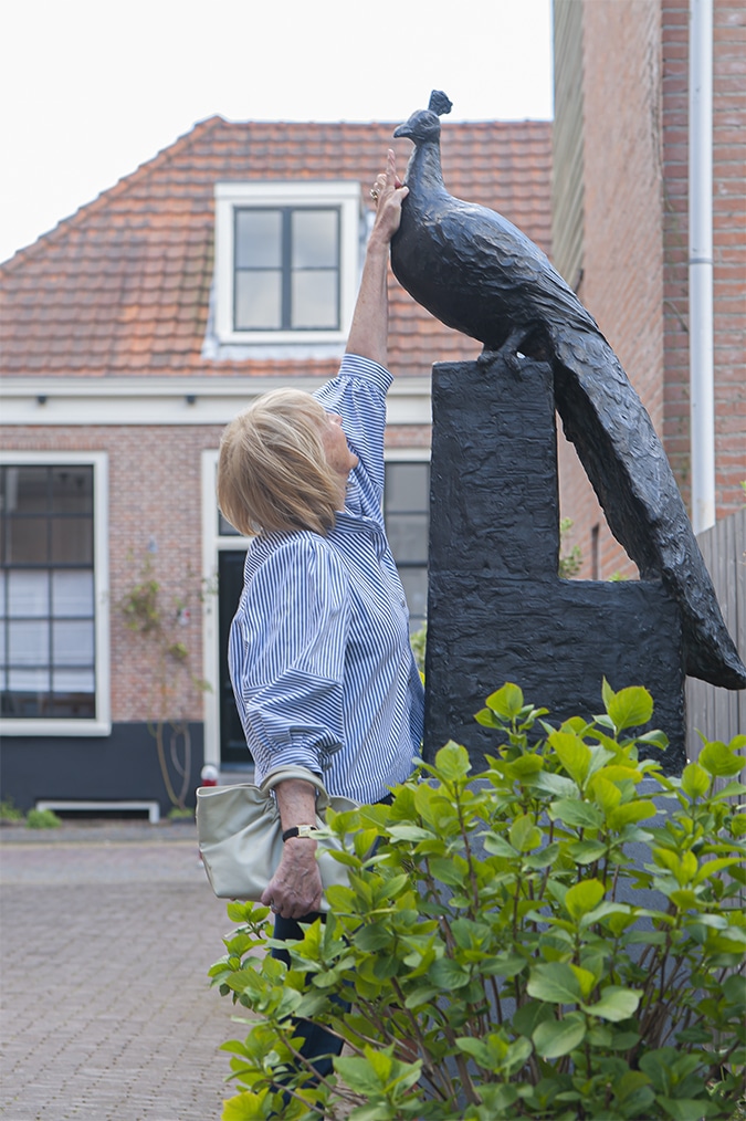 Striped jacket on flared jeans