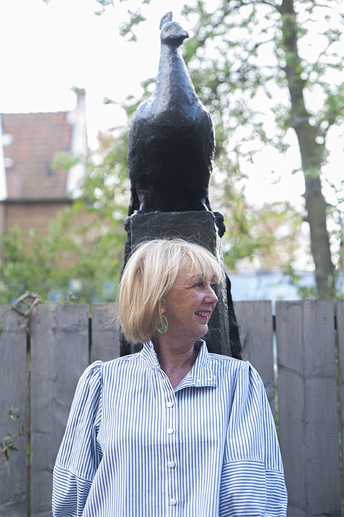 Striped jacket on flared jeans