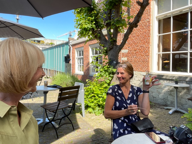 Kitty and me with cappuccino on a terrace