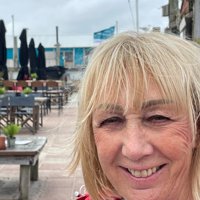 At the beach with windblown hair that needs washing