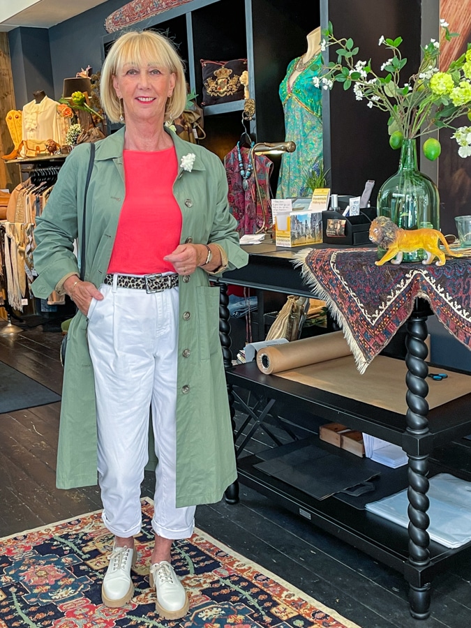 Coral jumper with white trousers