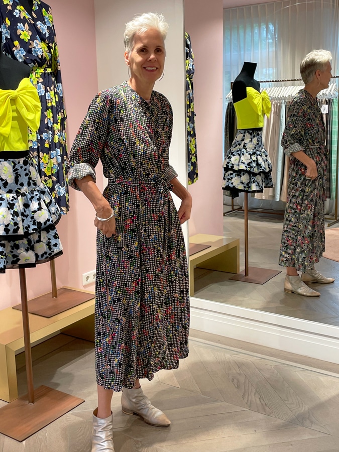 Sylvia trying on a dress