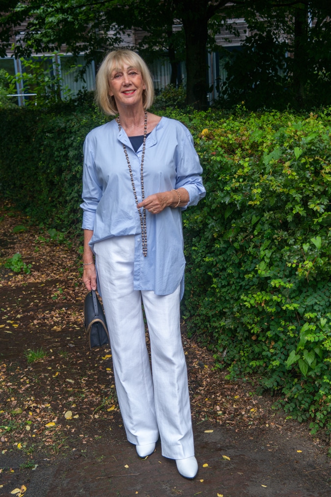 wide white trousers with long blue shirt