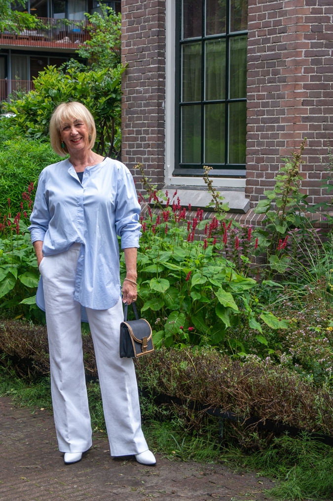 wide white trousers with long blue shirt