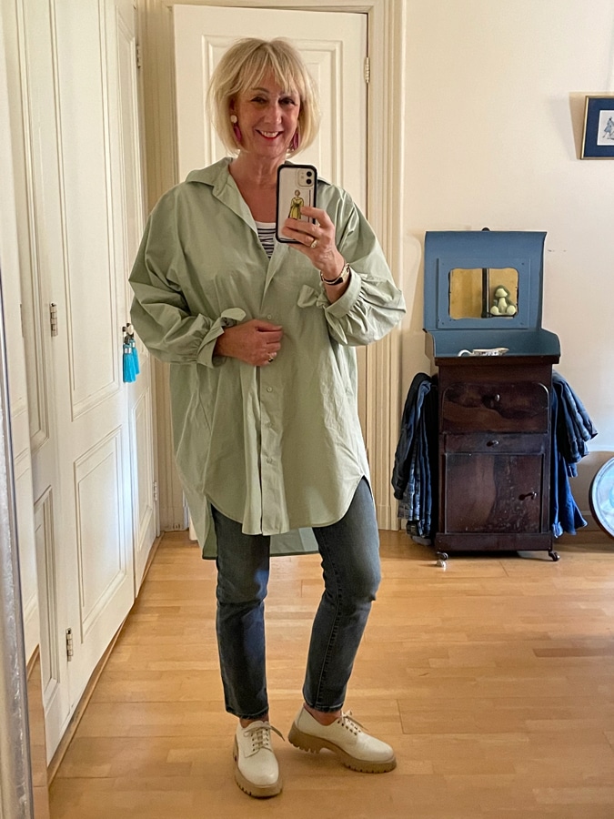 Light green oversized shirt on jeans