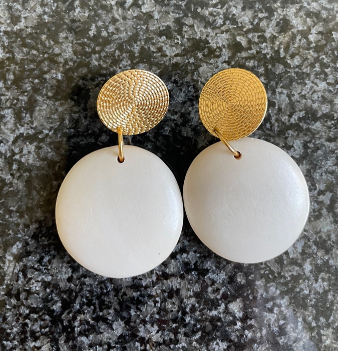 White earrings by Lara Design