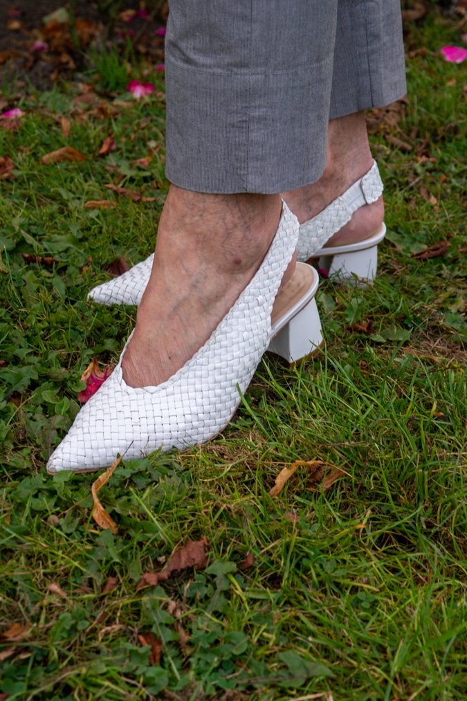 White low-heeled pumps