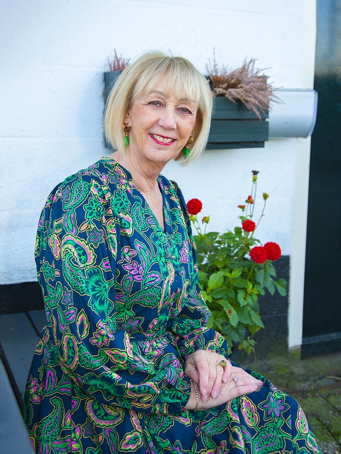Green earrings by Lara Design and paisley maxi dress