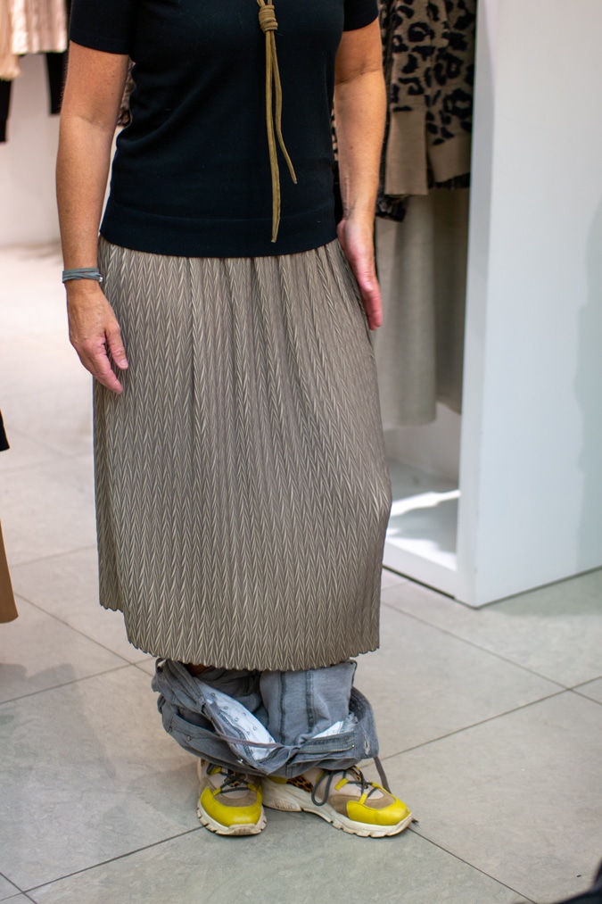 Claudia trying on a skirt for Marianne