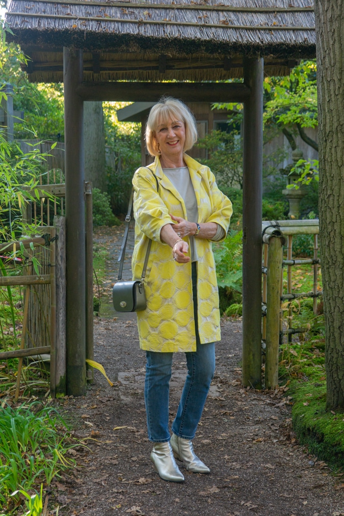 Simple grey top with a long yellow polka dot jacket