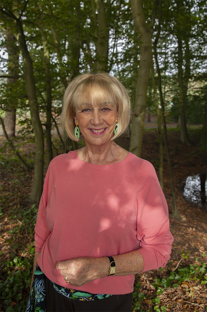 Pink jumper with mint-green earrings by Lara design