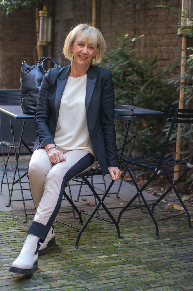 white combat boots and a black blazer