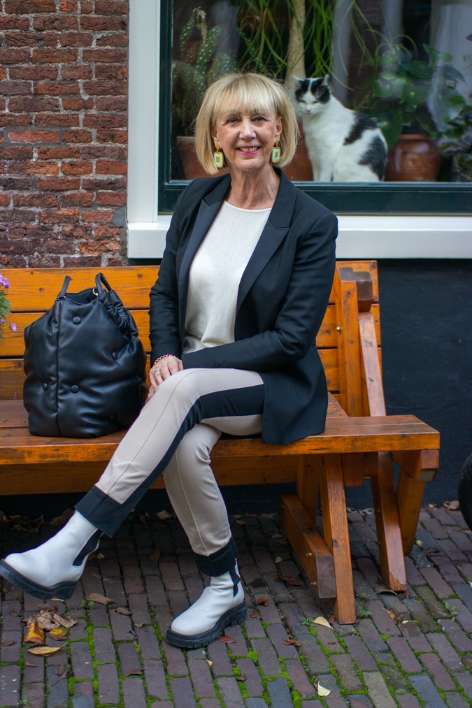 white combat boots and a black blazer
