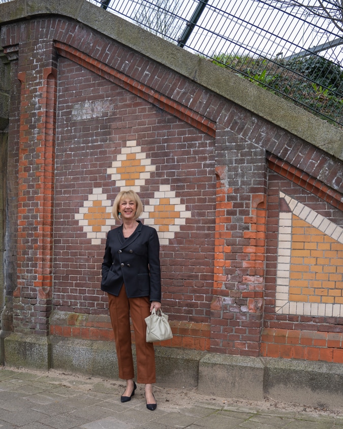 Cognac coloured trousers with a black blazer