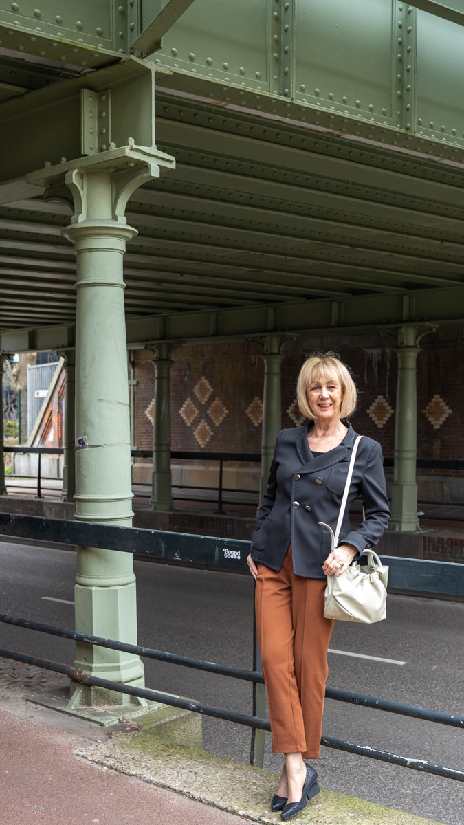 Cognac coloured trousers with a black blazer