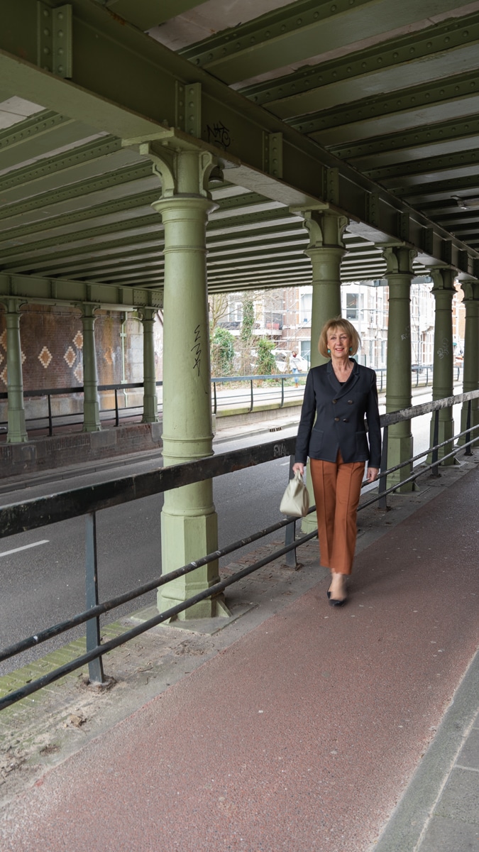 Cognac coloured trousers with a black blazer