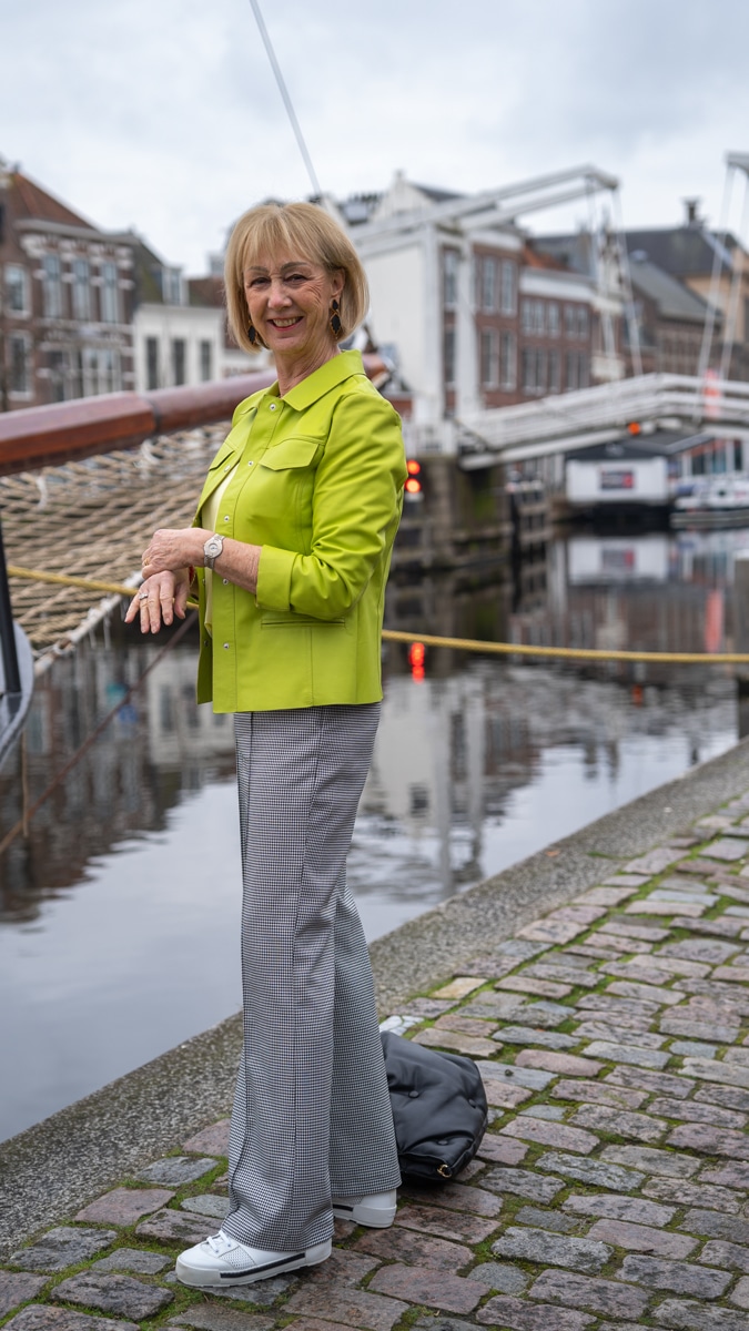Lime leather jacket with houndstooth trousers