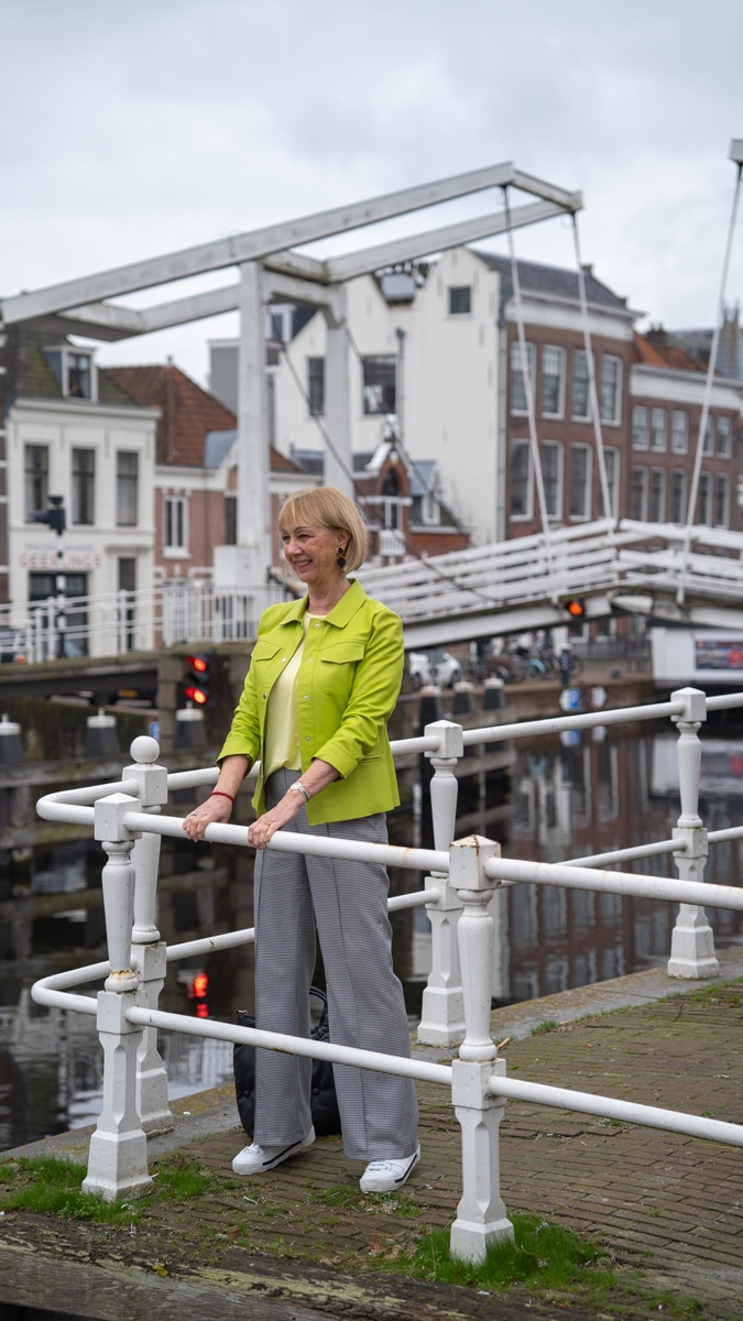 Lime leather jacket with houndstooth trousers