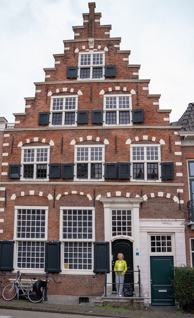 Lime leather jacket with houndstooth trousers