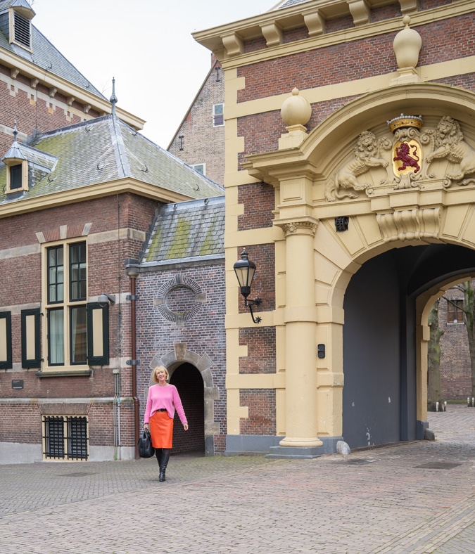 orange leather skirt with a pink jumper
