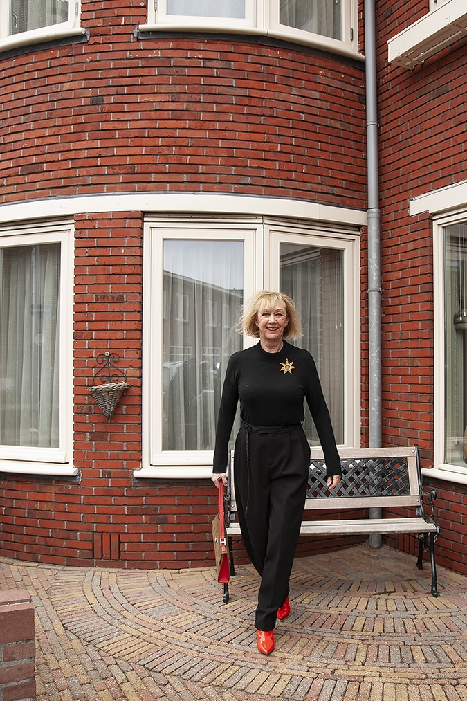 Wide black trousers with a black fitted top
