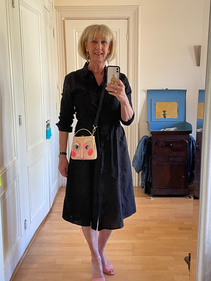 Black dress with portrait bag