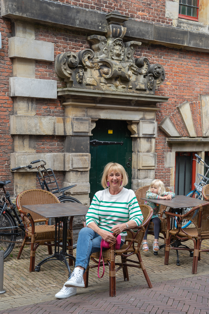 Green and white striped jumper