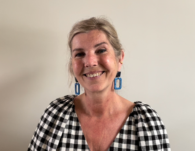 Marcella with blue earrings