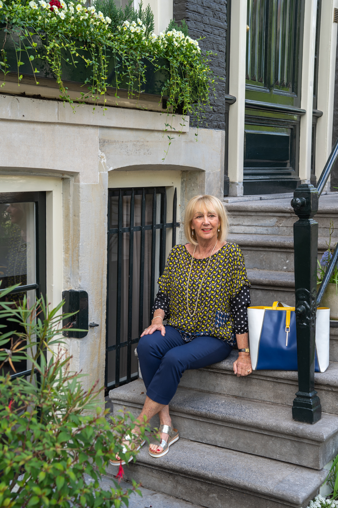 Kenzo top with blue trousers