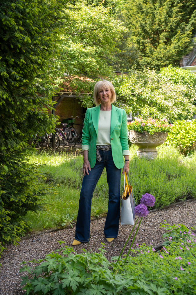 Kermit green jacket with flared jeans