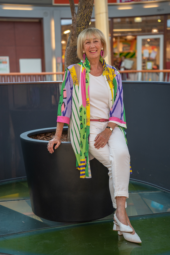 Colourful dress worn as a jacket