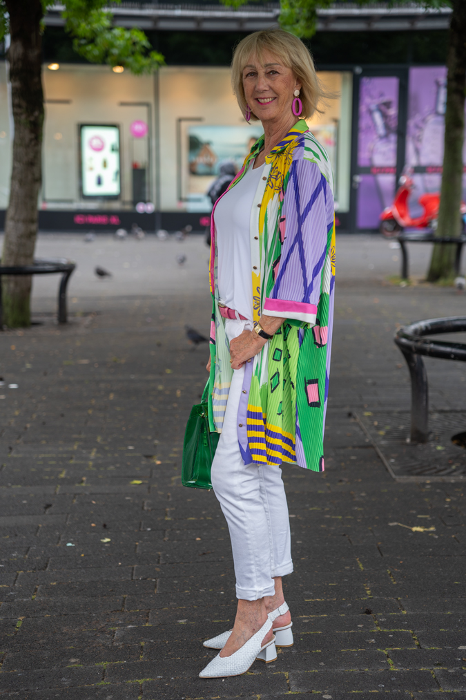 Colourful dress worn as a jacket