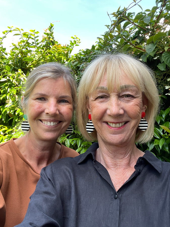 Marcella and me wearing the same earrings