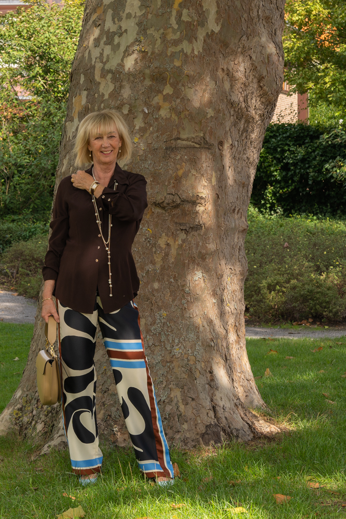 Arty print trousers with brown shirt