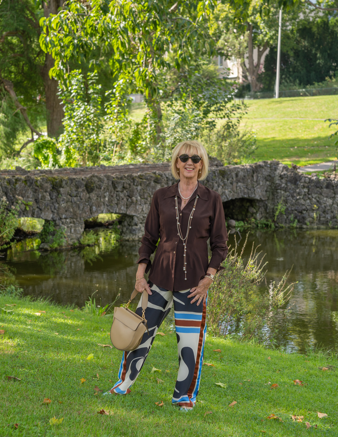 Arty print trousers with brown shirt