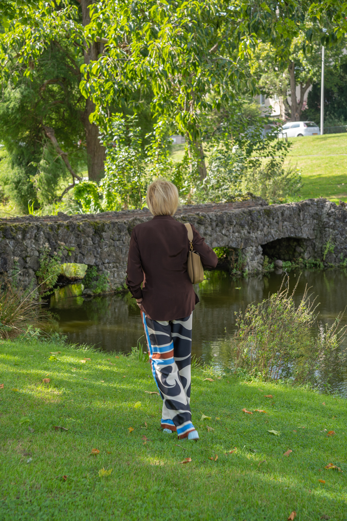 Arty print trousers with brown shirt