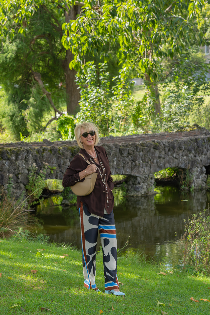 Arty print trousers with brown shirt