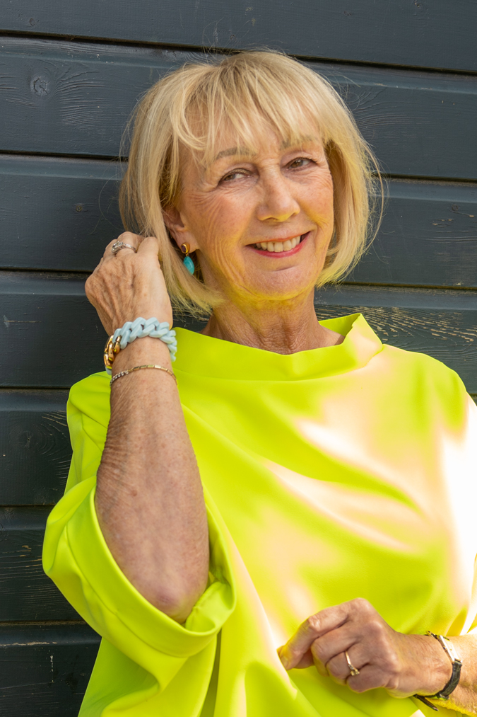 Neon yellow top with cognac coloured trousers