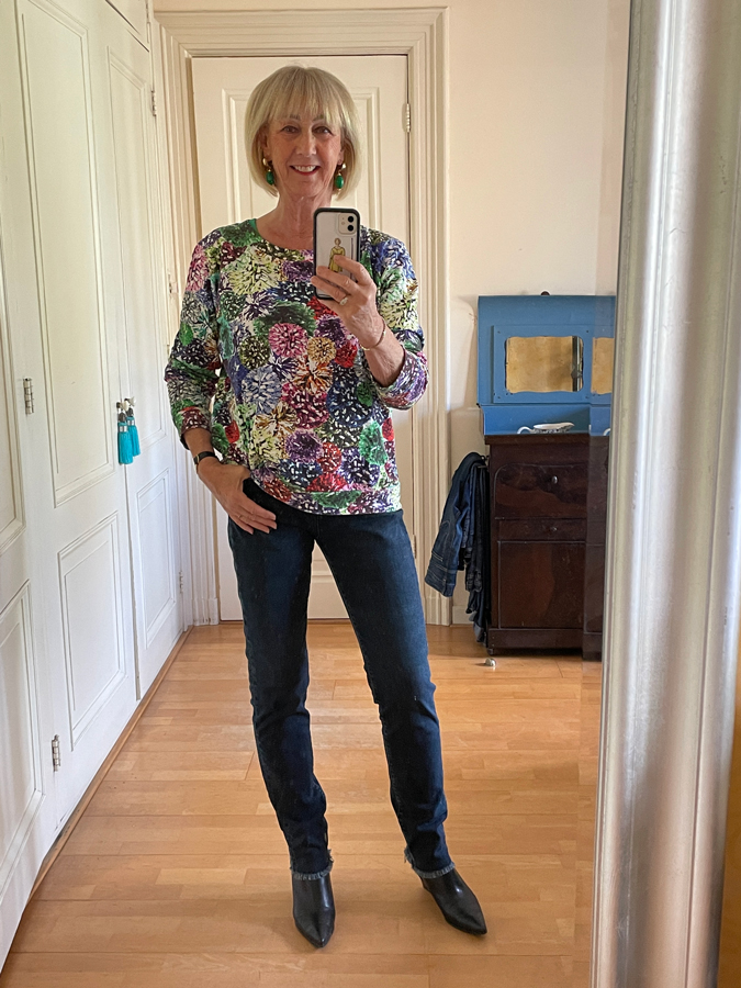 Jeans with colourful sweater