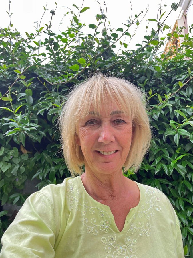 Beach hair and a pimple on the nose