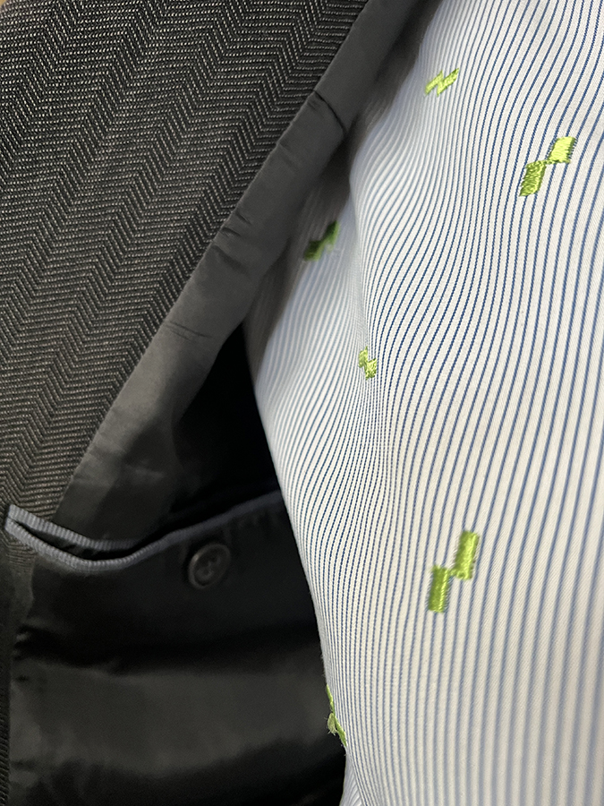 Close-up of the embroidery on the shirt