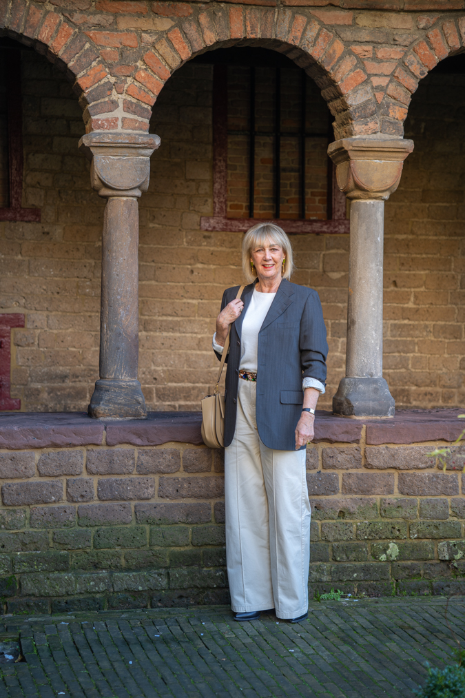 Wide cream trousers with an oversized blazer