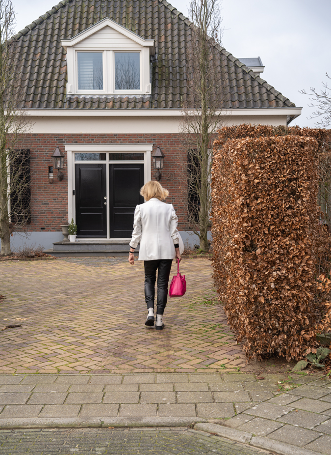 Leather trousers with white blazer