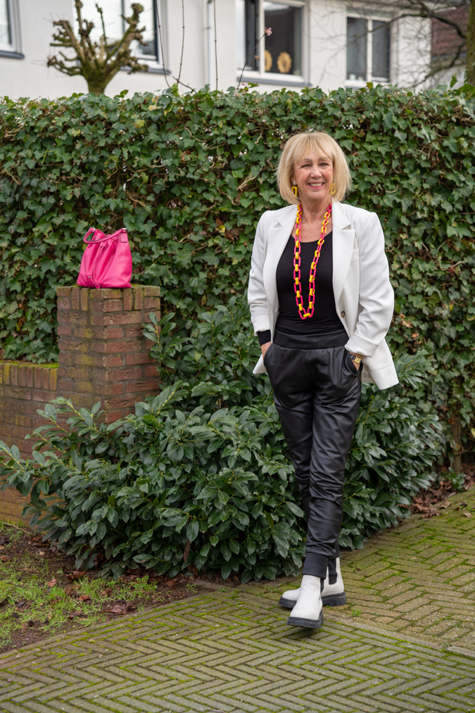 Leather trousers with white blazer