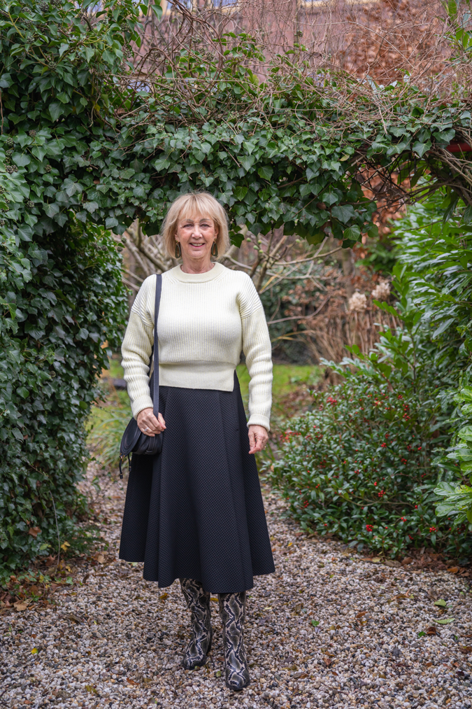 Wide black skirt with pale yellow jumper