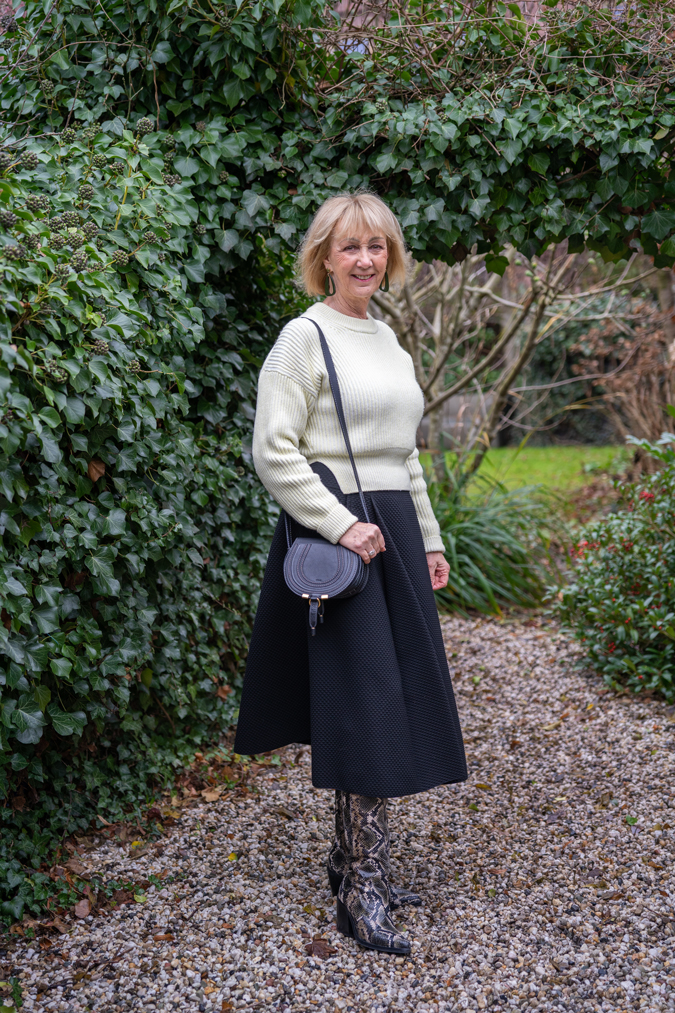 Wide black skirt with pale yellow jumper