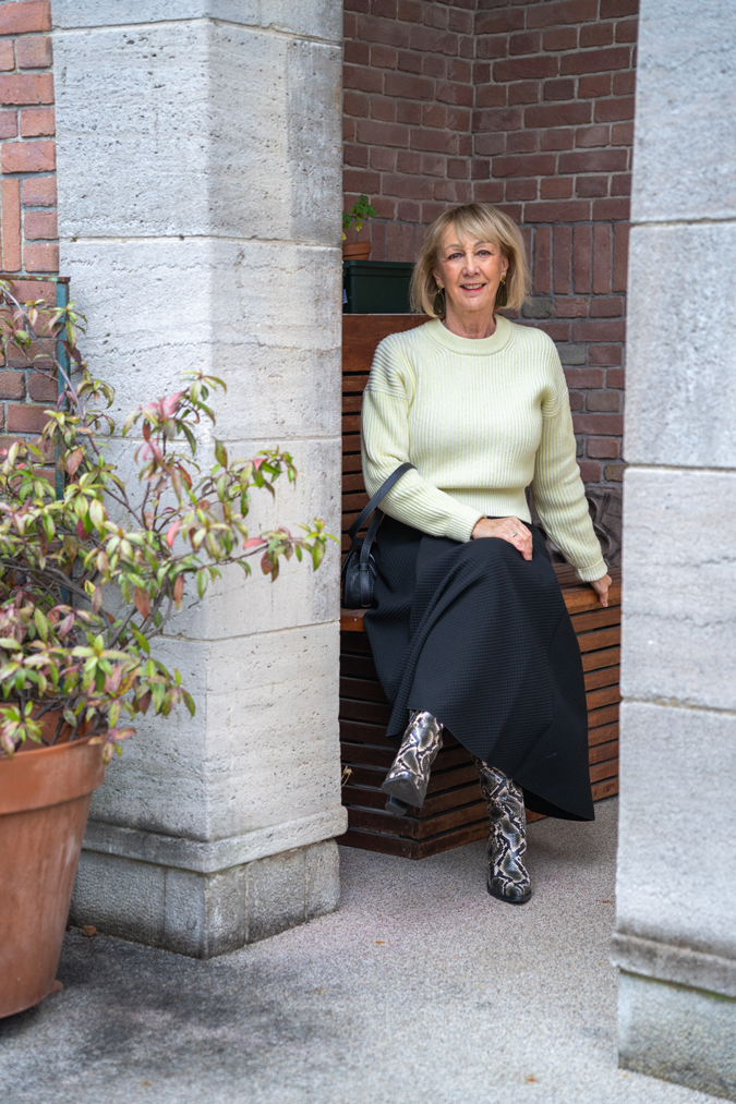 Wide black skirt with pale yellow jumper
